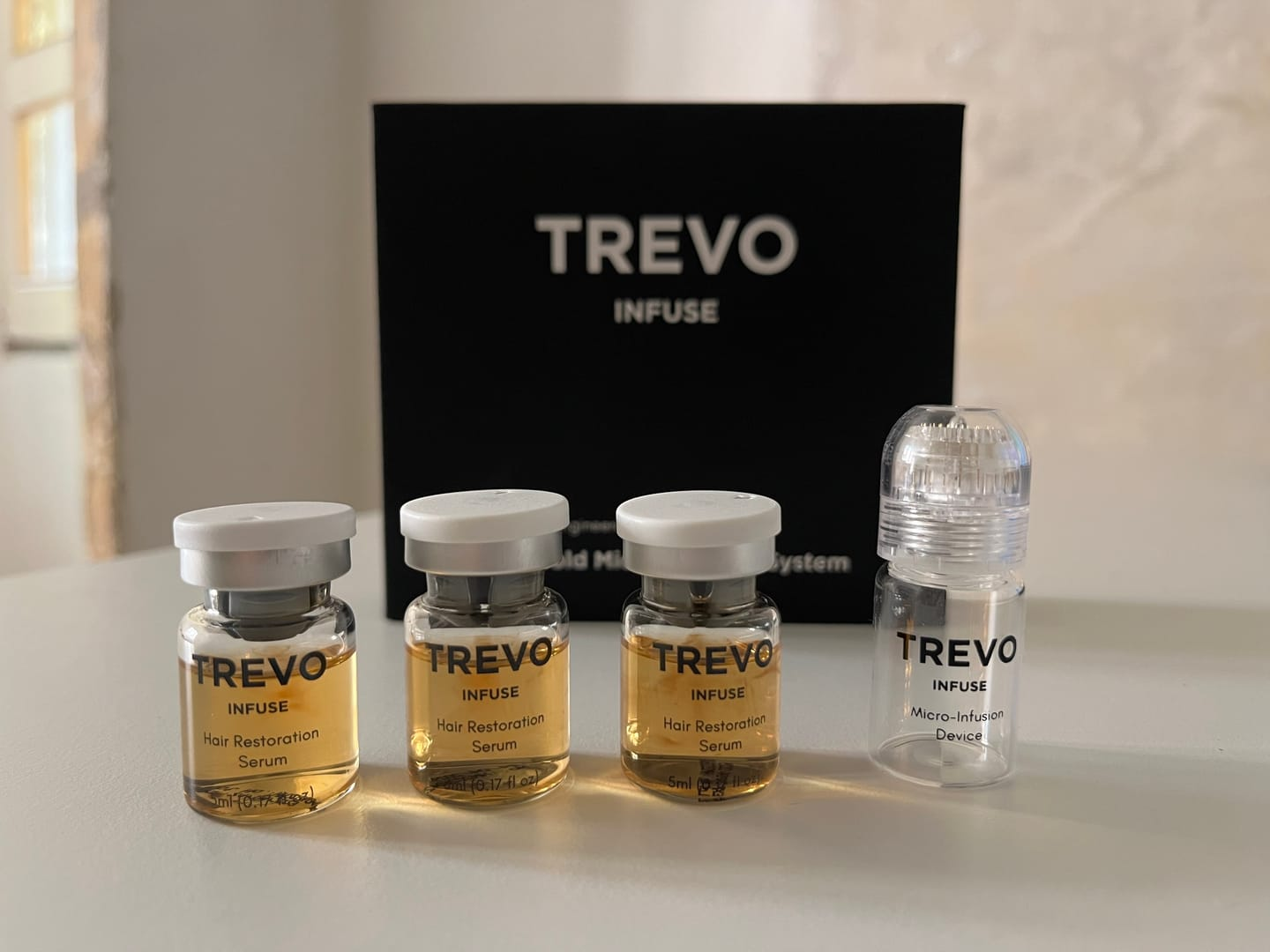 Customer photo — TREVO Infuse vials and device